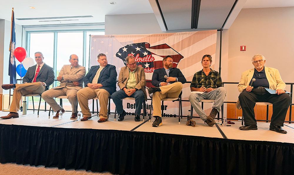 Greenville County Council candidates at the June 1 forum. From left: Kyle Long, Allen Kellett, Daniel Rumfelt, Rick Bradley, James Hoard, John Ehlers, and Joe Dill.