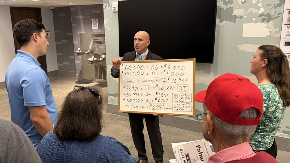 Curt McGahhey Speaking outside in Lobby Foyer after a Greenville County Republican Meeting defending his Penny Tax Referendum