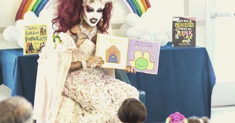Drag queen reading to young children at a public library