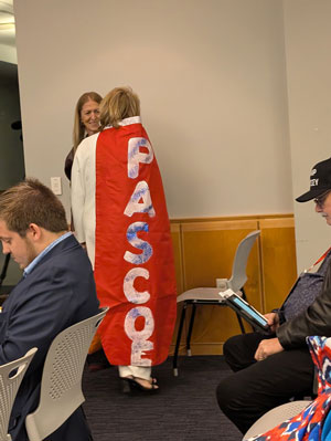 One Supporter shows her preference for attorney general at recent GOP meetingjpg