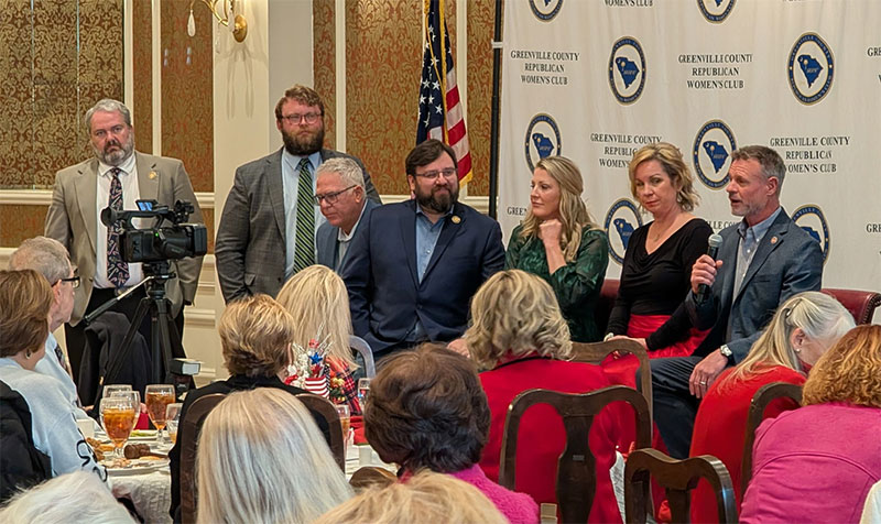 South Carolina Freedom Caucus members Chris Huff Stephen Frank Jay Kilmartin Thomas Beach April Cromer Sarita Edgerton and Lee Gilreath address the Greenville County Republican Women