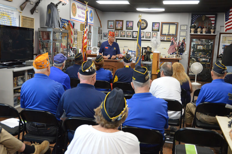 American Legion Alternate National Executive Committee Chairm Bob Scherer addressed members of District 5 meeting held at Major Rudolf Anderson, Jr. Post 214.
