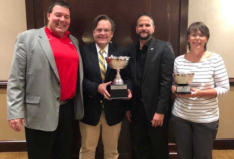 From left: Dean of the College of Wellness & Sport Professions Dr. Jeff Briggs, NGU President Dr. Gene C. Fant, Jr., Associate Athletic Director/Athletic Giving Micah Sepko, and Athletic Director Jan McDonald. 