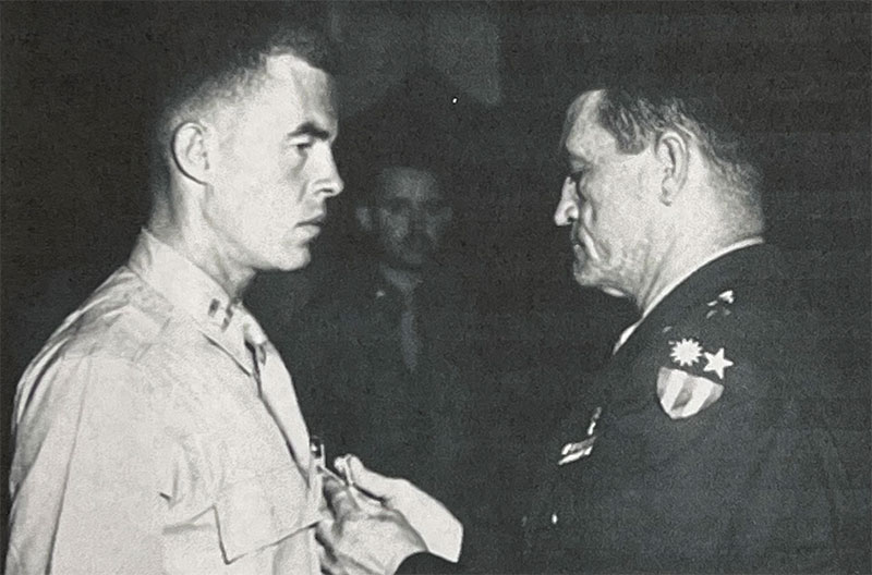 Capt. John Birch receives The Legion of Merit Medal from General Clair Chennault on July 17, 1944.