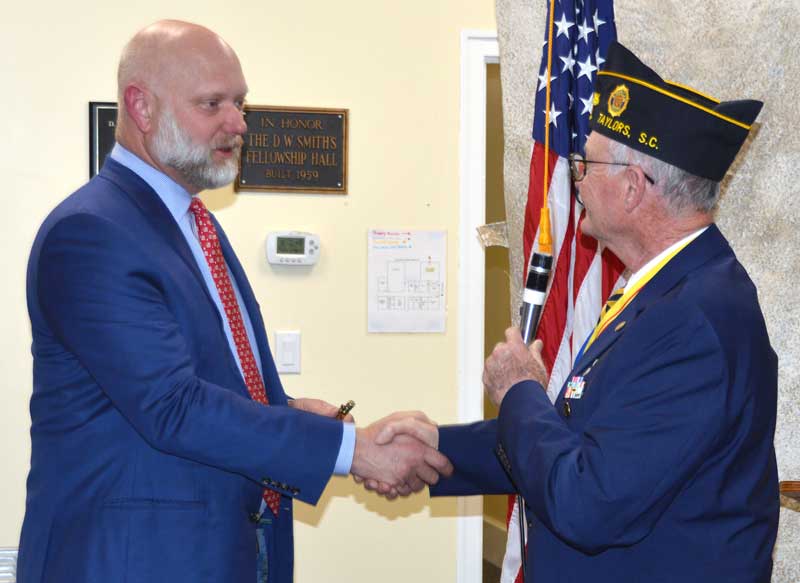 Post 214 Commander Clyde Rector thanks Producer Erik Weir (Greenville Resident for 11 years) for speaking at American Legion Post 214 Taylors.