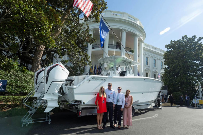 Scott Cothran, April Cothran, Billy Freeman and Sallie Freeman show their luxury fishing boat on the South Lawn of the White House, a product of Freeman Boatworks in South Carolina Monday, July 15, 2019, at the Made in America Product Showcase event held at the White House. (Courtesy Photo by Megan McFarland)