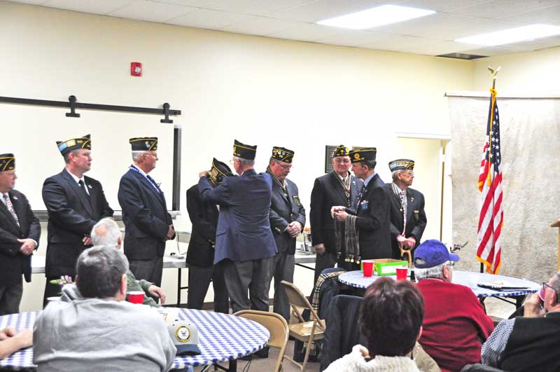 American Legion Color Guard members of Major Rudolf Anderson, Jr. Post 214 receives metals of Appreciation by Commander Clyde Rector and Adjutant Tony Dunn. Members from left to right: Wade Rhoney, Dale McCoy, Jim Nichols, Charlie Clifton, Bruce Bartlett, Pete Bellinger and Charlie Porter. Not pictured is Alan James and Don Whitehead. - Photo by Stuart McClure