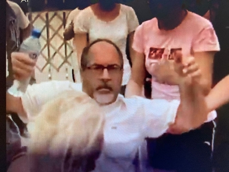 Reverend Mahoney Being Arrested in Tiananmen Square During the 2008 Beijing Summer Olympics