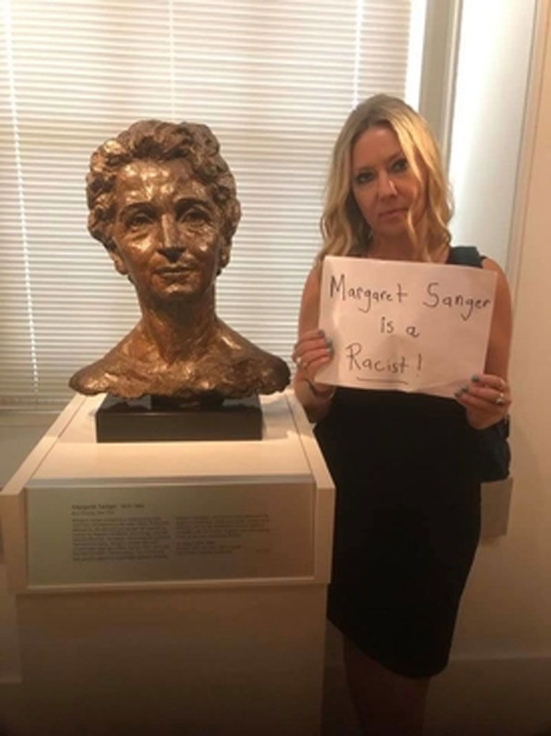 Brandi Swindell, Founder and CEO of Stanton Public Policy Center, protests the inclusion of a bust of Margaret Sanger at the National Portrait Gallery in Washington D.C.