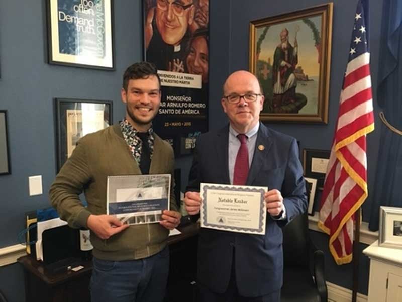 Nathan Wineinger from 21Wilberforce with Congressman Jim McGovern (D-MA) who earned the top score in the House of Representatives on the IRF Congressional Scorecard.