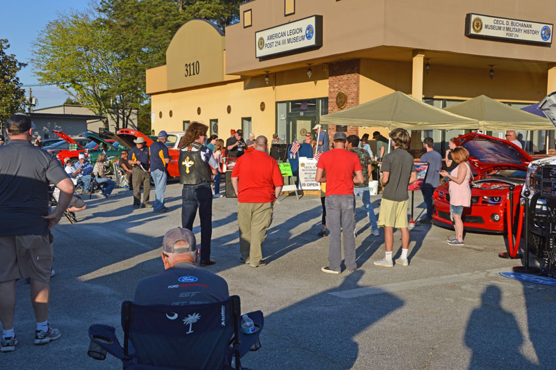 Car Show Director Ed Collins conducts raffle at Posts 214 Car Show.