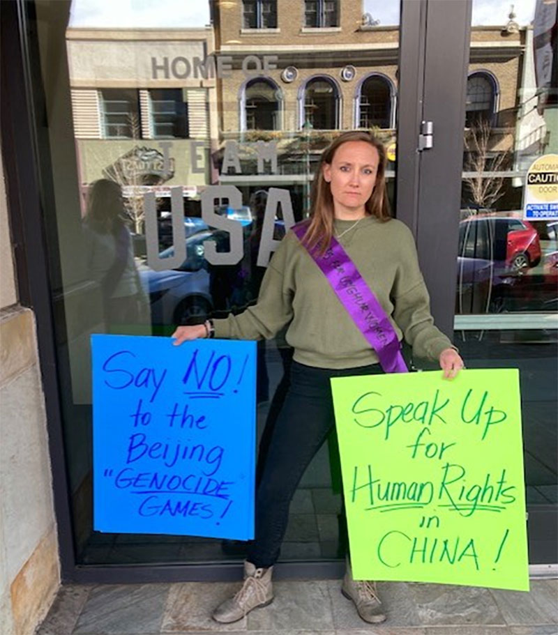 Danielle Versluys protesting outside of US Olympic Headquarters.