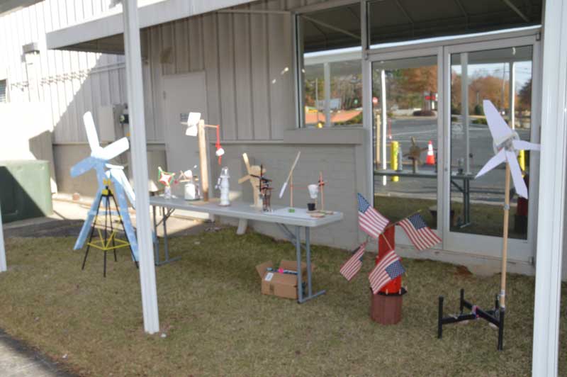 Lakes & Bridges science students display their projects outside the school.